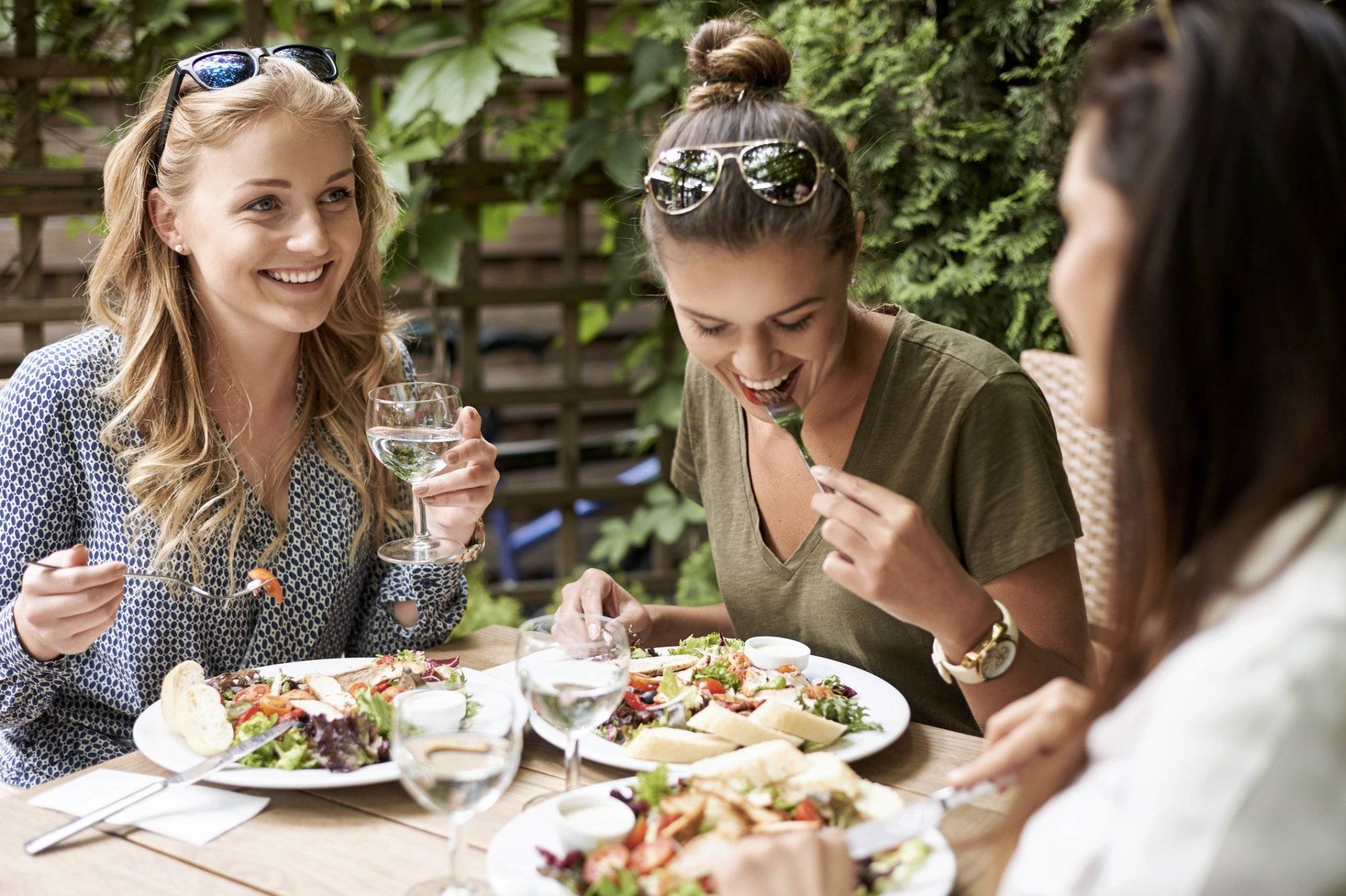 Meeting of girls at the fashion restaurant