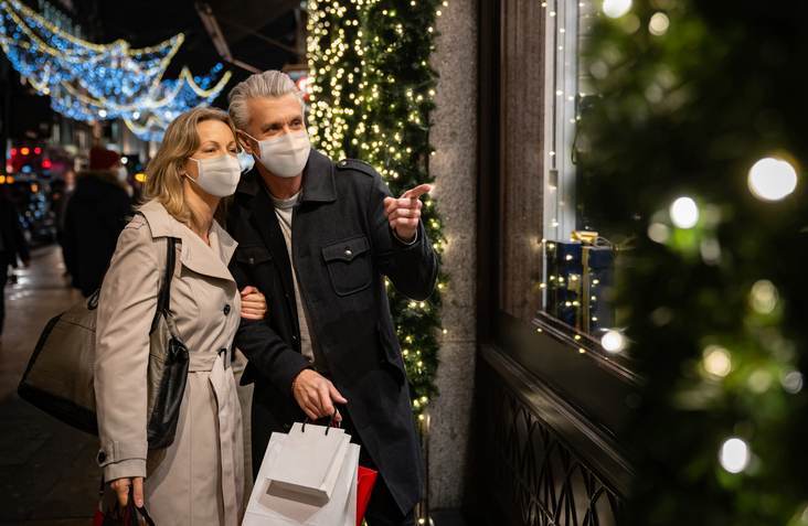Couple Christmas shopping wearing a facemask in London Celebrate Thanksgiving 2020 by Preparing for the Holiday Season at Park Place
